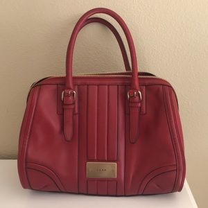 L.A.M.B. red handbag (by Gwen Stefani)